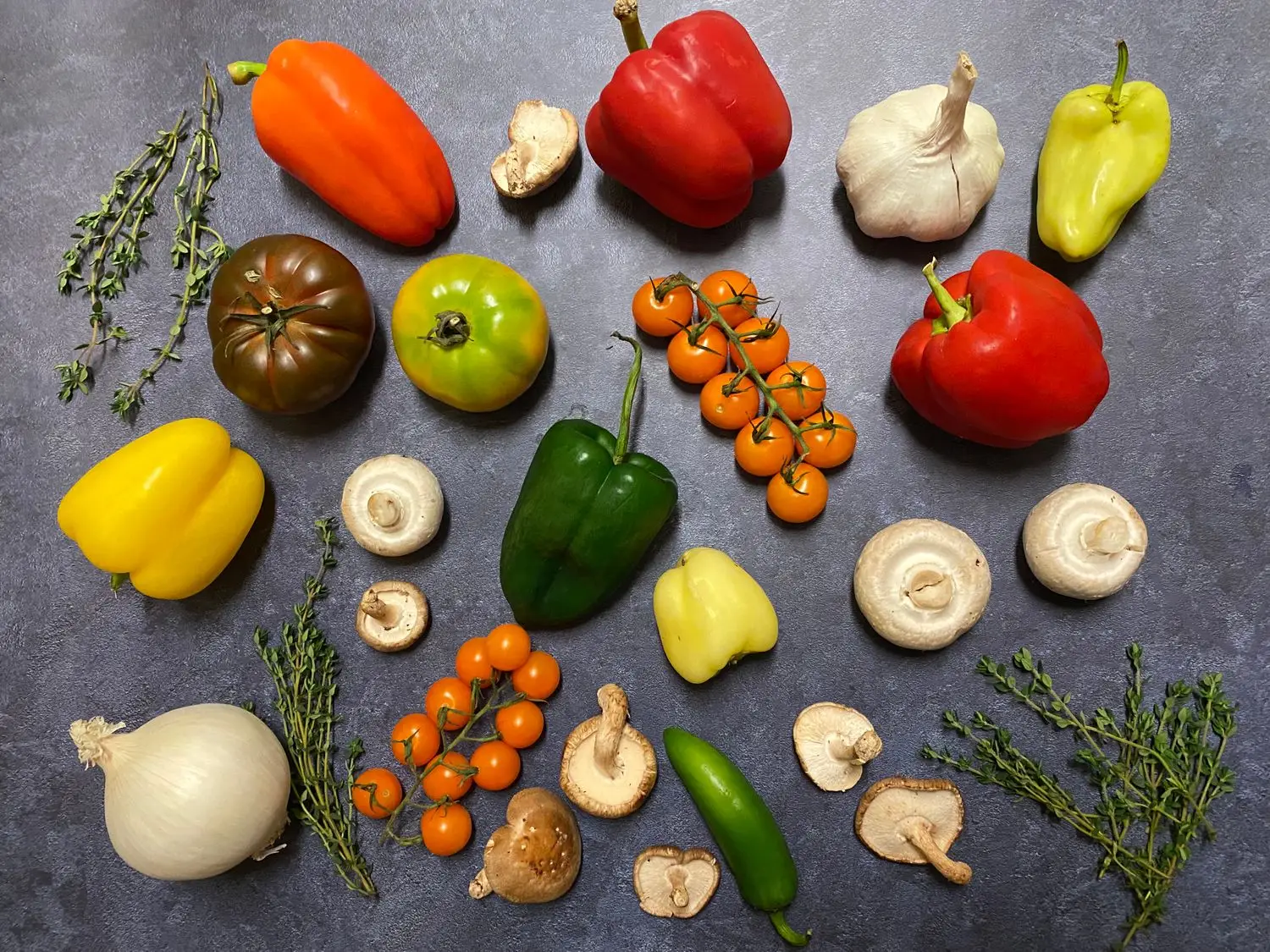Colourful fresh vegetables arranged for kitchen preparation